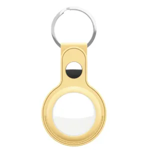 KeyBudz AirTag-nøgleringsholder i læder med nøglering i metal, vist i pastelgul på hvid baggrund