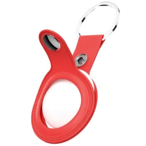 KeyBudz punainen nahkainen AirTag-avaimenperäpidike nepparikiinnityksellä ja metallirenkaalla, kuvassa AirTagin kanssa