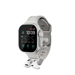 KeyBudz Sync+ grå Apple Watch-rem med integrerad AirPods-hållare, med två AirPods förvarade undertill.