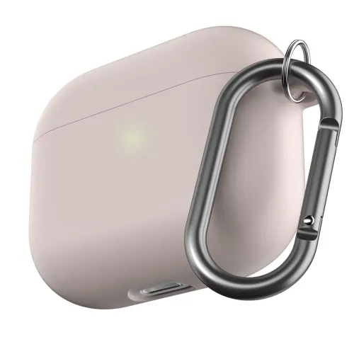 Pastel pink AirPods case with rounded edges, green LED on the front and dark gray carabiner attached to ring on the right side, close.