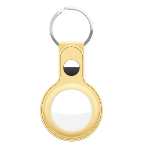 Keybudz lädernyckelring för AirTag i pastellgult, med rund synlig öppning, knappfäste och silverfärgad metallnyckelring.