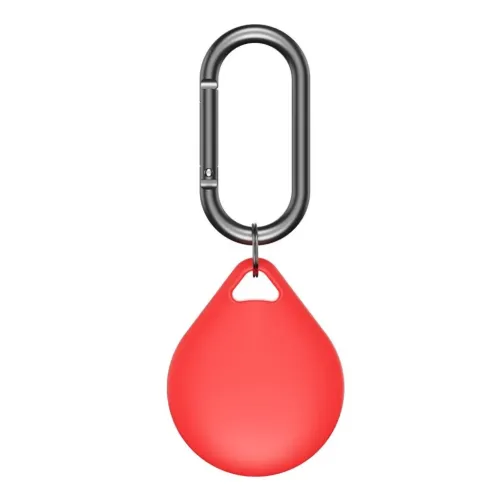 Red teardrop-shaped AirTag holder with triangular grip hole, attached with small ring to dark carabiner; exposed against white background.