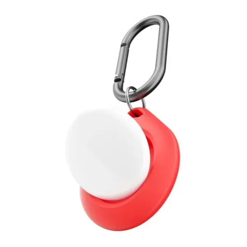 Red AirTag holder with round opening and shiny white tray, suspended from a dark metal carabiner with spring lock, exposed close.
