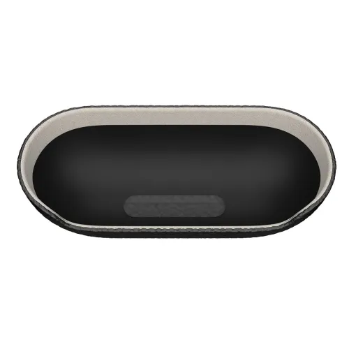 Läderfodral för AirPods, visat uppifrån: svart ovalt lock med ljus kant, slät inneryta och rektangulärt fält i centrum.